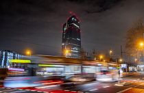 A tram passes the European Central Bank in Frankfurt, Germany