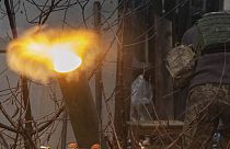 A Ukrainian serviceman of the 57th Mechanised Brigade fire 120mm mortar towards Russian positions near Kharkiv, Ukraine, Tuesday, Dec. 24, 2024