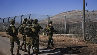 Israeli soldiers patrol the perimeter of the agricultural settlement of Avivim, next to the Lebanese border in upper Galilee, Israel, Monday Dec. 2, 2024.