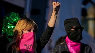 Demonstrators take part in a rally ahead of the International Day for the Elimination of Violence against Women which will be held on Nov. 25, in Rome, Saturday, Nov. 23, 2024