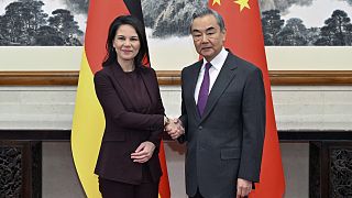 Chinese Foreign Minister Wang Yi, right, meets with German counterpart Annalena Baerbock in Beijing Monday, Dec. 2, 2024.