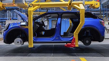 Ford Explorer electric cars - the firm's first in Europe - stand in the hall at the start of production, in Cologne, Germany, Tuesday June 4, 2024.