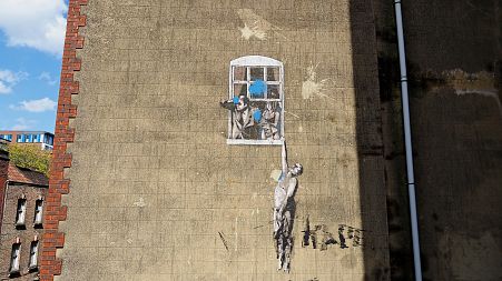 Banksy's "Well Hung Lover"