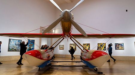 A replica of the Macchi Castoldi MC.72, which set a world speed record for piston-engine seaplanes in 1934, is on display at the Time of Futurism exhibition in Rome