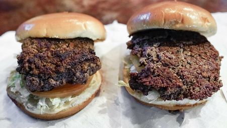 A conventional beef burger on the left and a plant-based burger containing wheat and potatoes protein, as well as coconut oil on the right